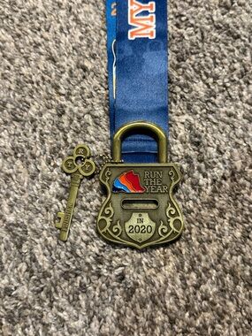 Run The Year 2020 Brass Finisher Medal with Blue Ribbon